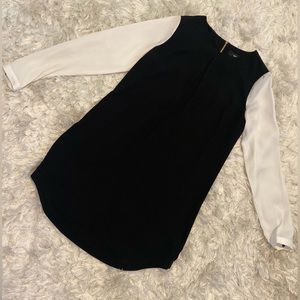 Black dress with white sleeves